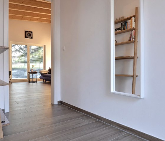 Blick aus dem Flur in den Wohnbereich, © Ferienhäuser Brieden Blick aus dem Flur in den Wohnbereich, © Ferienhäuser Brieden