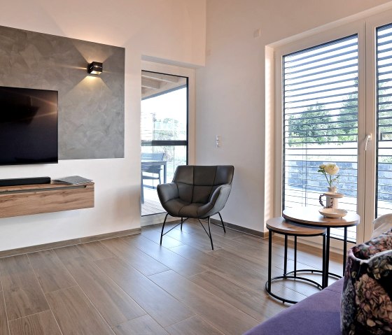 open woonkamer met keuken, © Ferienhäuser Brieden