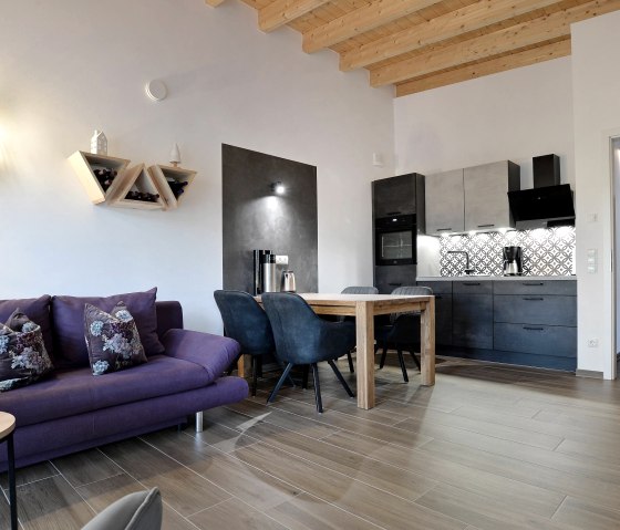 open woonkamer met keuken, © Ferienhäuser Brieden