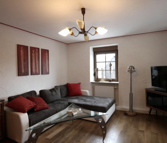 Wohnbereich der Ferienwohnung Tankstopp, &copy; Familie Berens