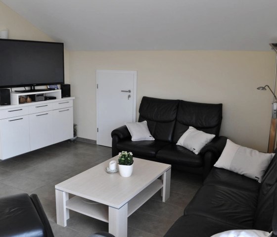 Wohnzimmer mit TV, &copy; Ferienwohnung M&uuml;nich